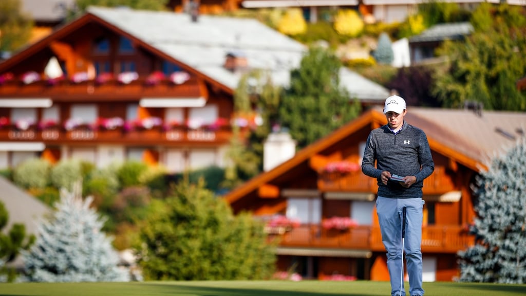 Matthew Fitzpatrick waits to play on the 14th hole at the European Masters golf tournament in Crans-Montana, Switzerland. Photo: EPA