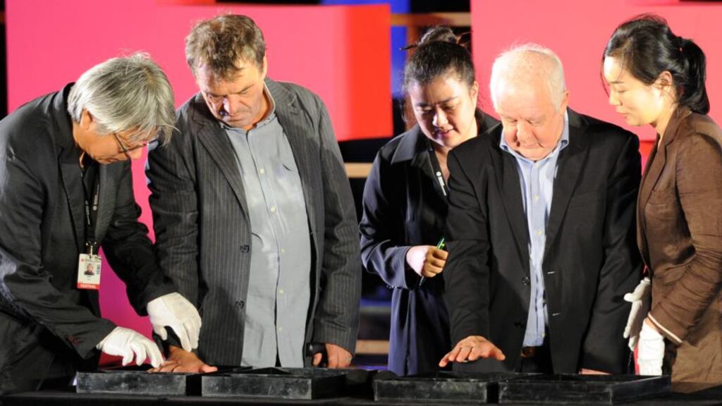 Hand-printing: Neil Jordan and Jim Sheridan at a festival event. Photograph: Ted Aljibe/AFP/Getty