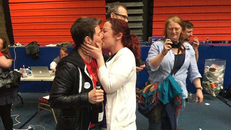 Katie Stoica (right) celebrates after her girlfriend Billie proposed at the University Sports Arena count centre in Limerick. Photograph: Kathryn Hayes