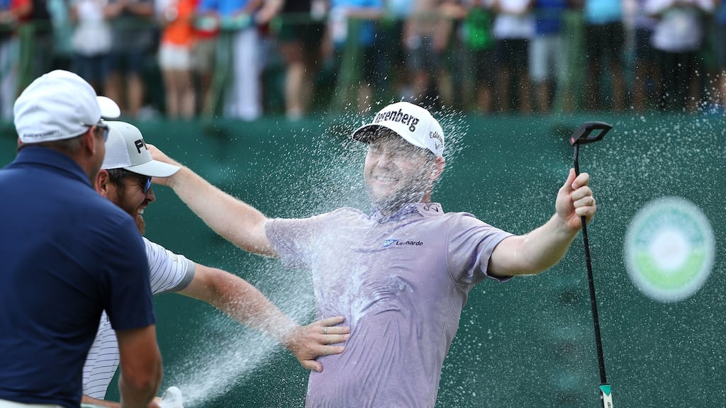 South Africa’s Branden Grace is sprayed with champagne after his victory on the 18th green during the final round of the Nedbank Golf Challenge at Gary Player CC in Sun City, South Africa. Photograph: Richard Heathcote/Getty Images