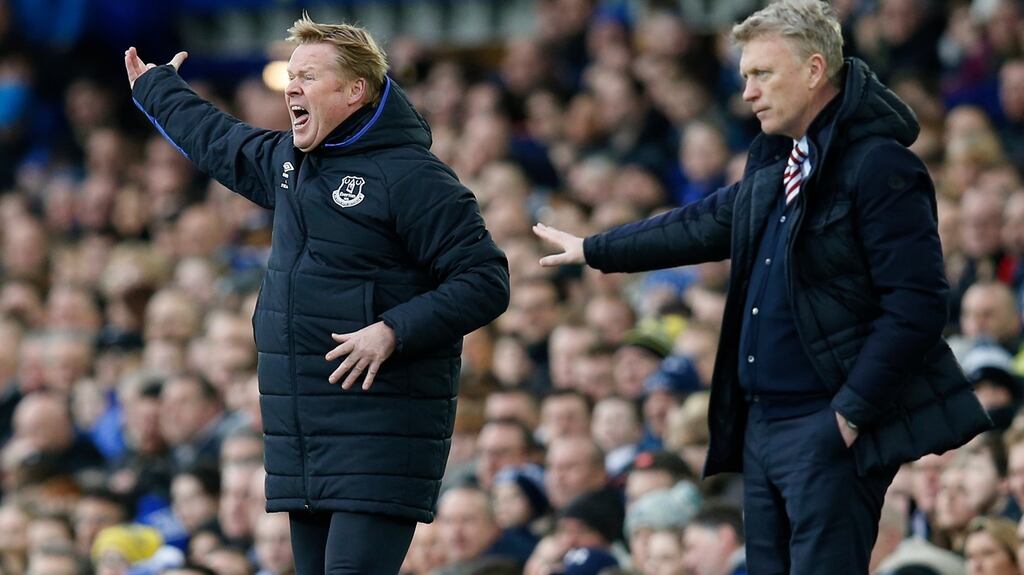 Sunderland manager David Moyes and Everton manager Ronald Koeman give instructions to their players. Photograph: Reuters