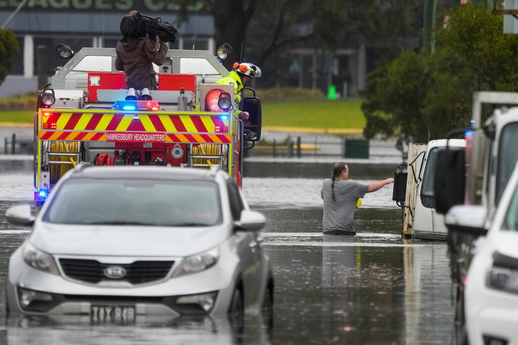 The federal government has declared the floods a natural disaster, helping flood-hit residents receive emergency funding support. Photograph: Mark Baker/AP