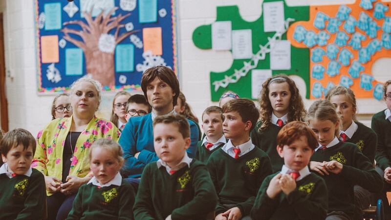 RTÉ series ‘The School’ stars Laura O’Mahony and Tadhg Hickey with their co-stars, the pupils of Walterstown National School in Cobh, Co Cork