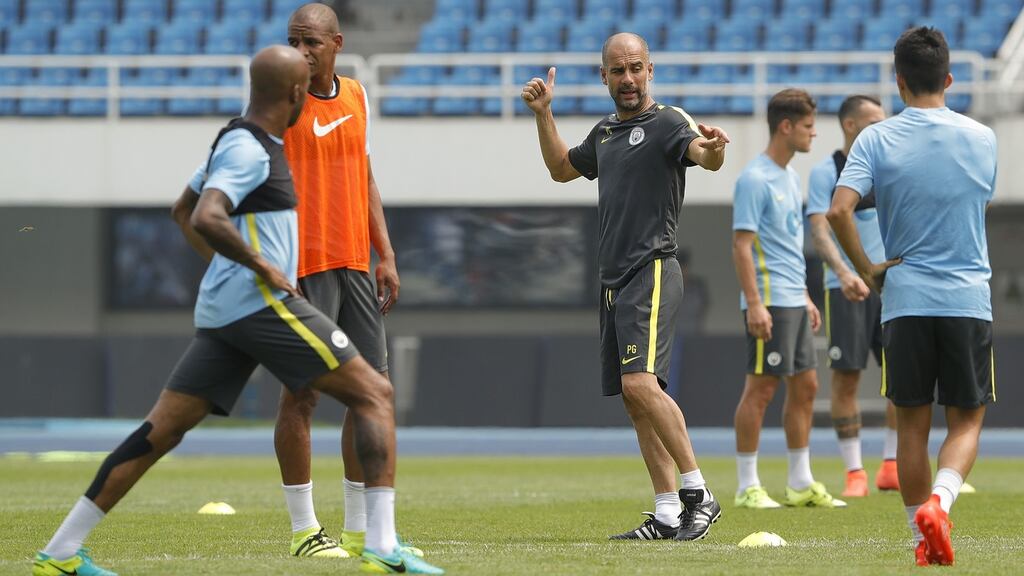 Manchester City’s manager Pep Guardiola during pre-season training in Beijing. Photograph: Lintao Zhang/Getty Images