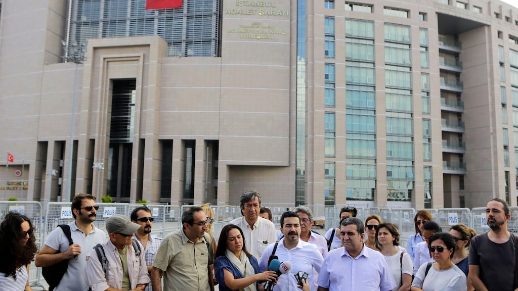 Journalists gather outside a court building in Istanbul to support their colleague journalist Bulent Mumay, who was detained on Tuesday in connection with the investigation launched into the failed coup attempt in Turkey on July 15th. Photograph: Petros Karadjias/AP