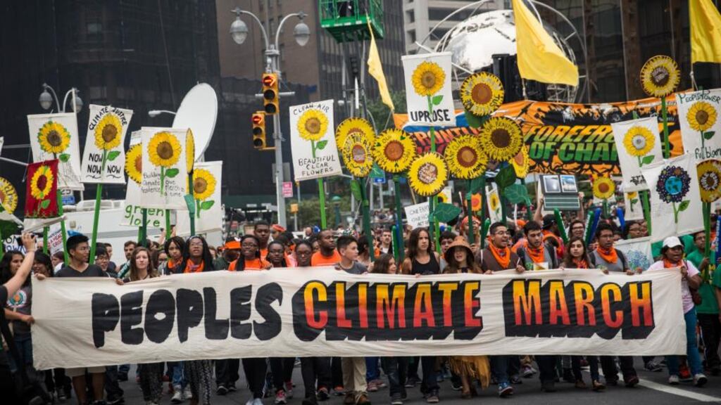 People rally for greater action against climate change during the People’s Climate March on Sunday, September 21st, in New York City. Photograph: Andrew Burton/Getty Images