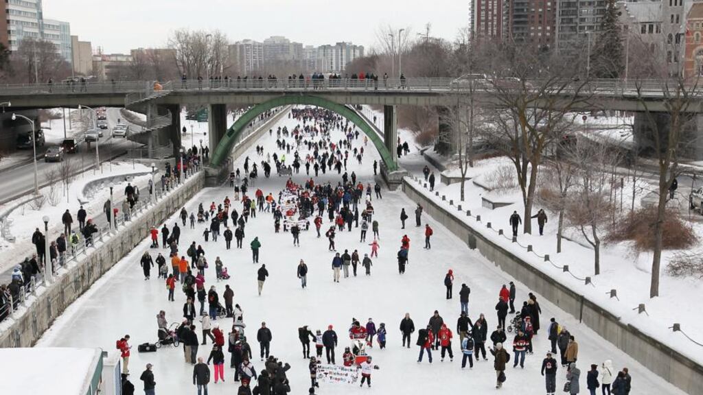 Commuting on the frozen Rideau Canal in Ottawa. Photographs: Getty