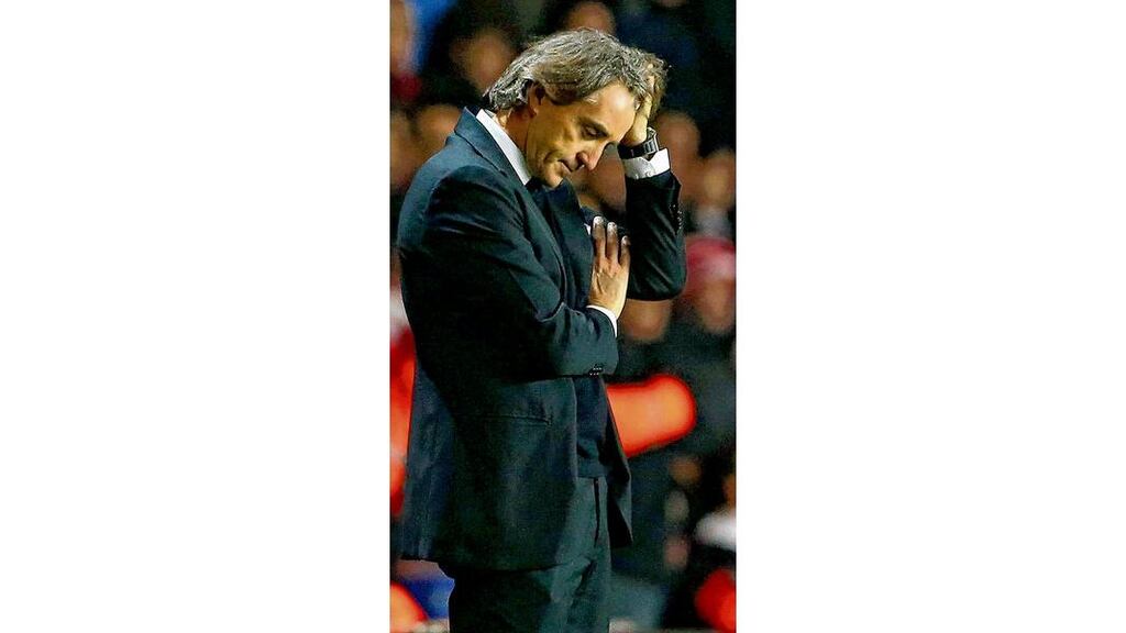 Manchester City manager Roberto Mancini shows his frustration during Saturday's defeat to Southampton at St Marys Stadium, Southampton. photograph: getty images