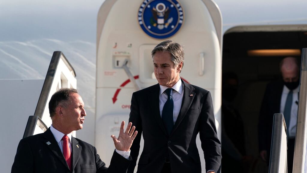 US secretary of state Antony Blinken is greeted by Israeli foreign minister Gabi Ashkenazi as he steps off the plane at Tel Aviv airport on Tuesday. Photograph: Alex Brandon/Pool/AP