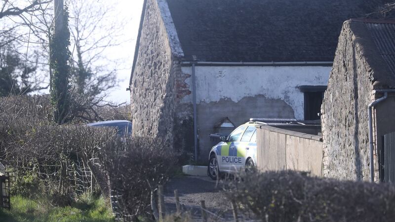 Police at the house just outside Larne in Co Antrim. Photograph: Niall Carson/PA Wire