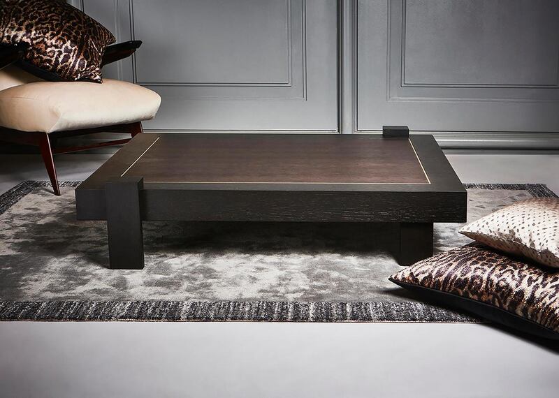 Two tone oak veneer coffee table with brass inlay measuring 120x100x29cm and priced €750