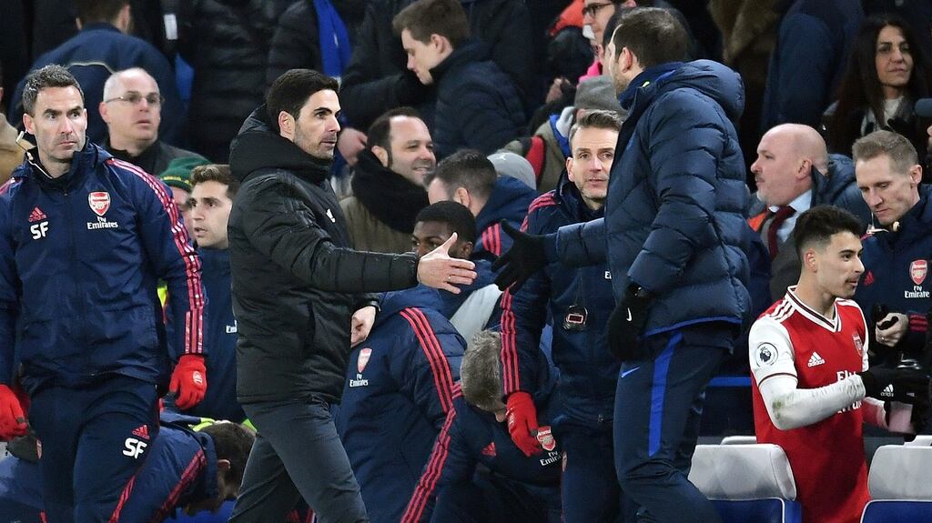 Arsenal manager Mikel Arteta with his Chelsea counterpart Frank Lampard after last night’s draw. Photograph: EPA