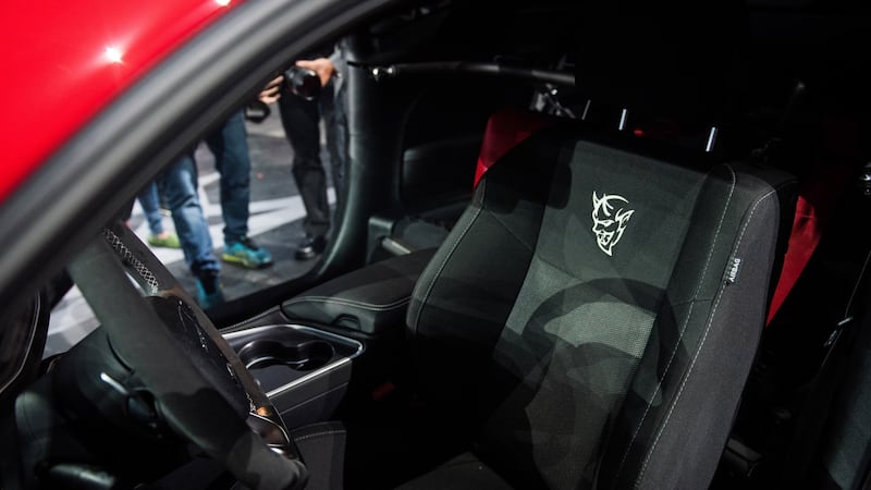 The Dodge Challenger SRT Demon takes the already-ridiculously-powerful 710bhp 6.2-litre supercharged V8 engine from the Challenger Hellcat, and cranks it into full-blown insanity for an output of 850bhp. Photograph: Julie Jacobson