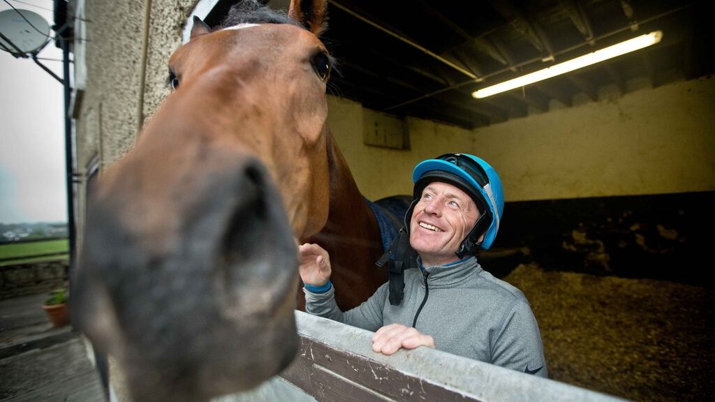 Kieren Fallon with a two-year-old filly from Fatal Attraction at the Curragh training grounds in Kildare. Photograph: Morgan Treacy/Inpho