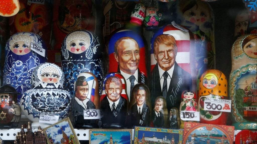 Matryoshka dolls with images of Vladimir Putin and Donald Trump, who no longer features prominently on Russian TV. Photograph: Sergei Karpukhin