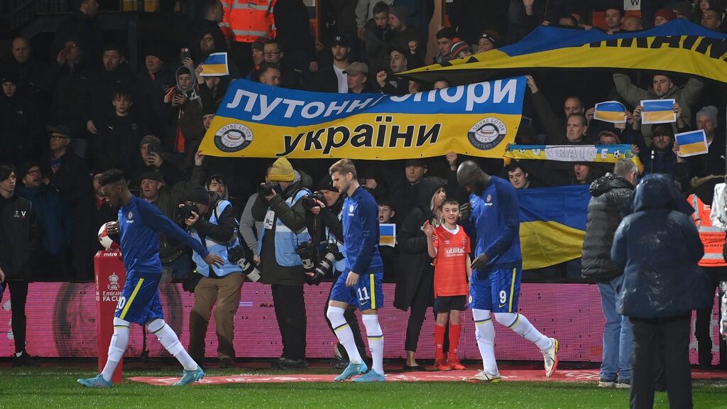 Luton fans show their support for Ukraine ahead of last night’s FA Cup match against Chelsea. Photograph: Michael Regan/Getty Images