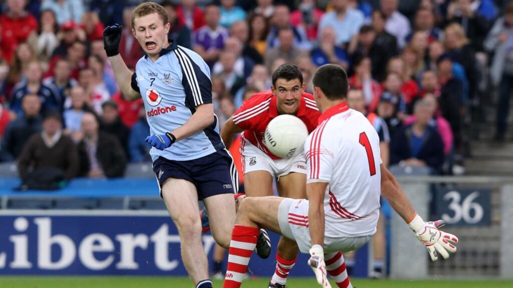 Dublin’s Jack McCaffrey scores a goal past Cork goalkeeper Alan Quirke. Photograph: Cathal Noonan/Inpho