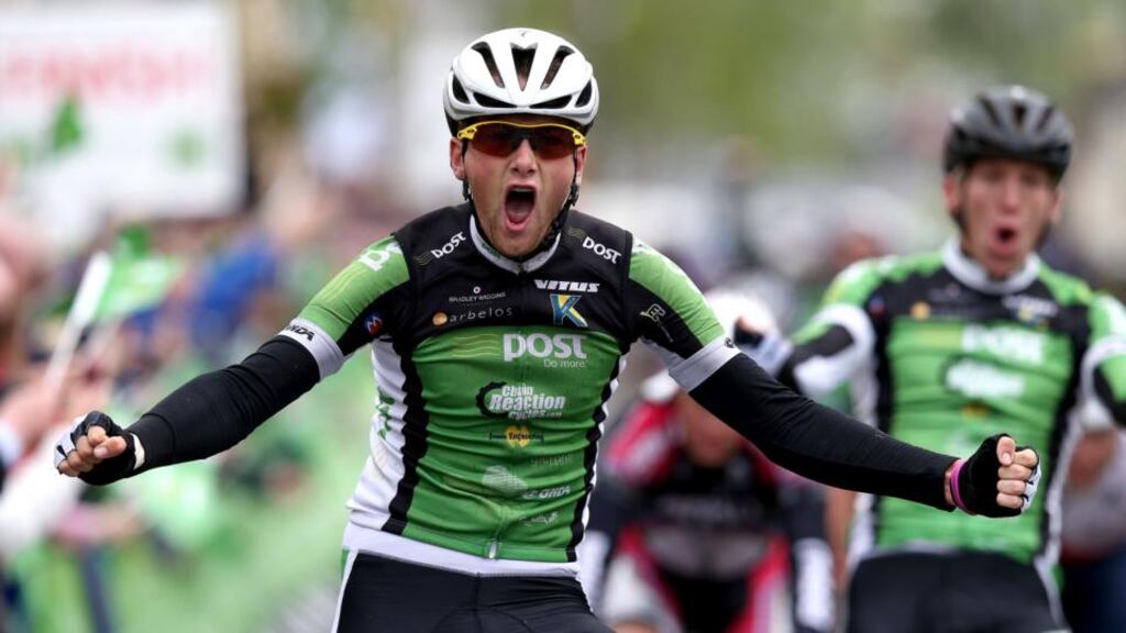 Robert McCarthy of An Post Chain Reaction celebrates winning stage one of the An Post Rás from  Dunboyne to Roscommon. Photograph: Dan Sheridan/Inpho