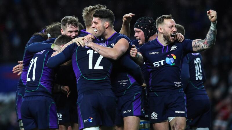 Scotland players celebrate Sam Johnson’s try against England at Twickenham. Photograph: Ryan Byrne/Inpho