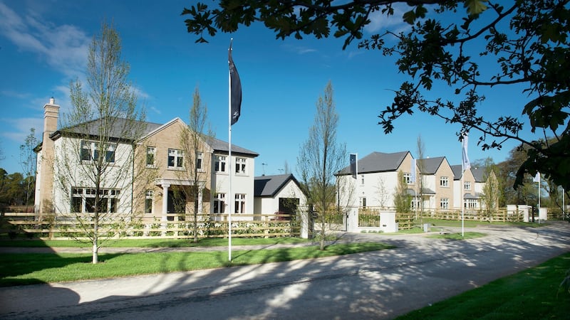 All houses feature laurel hedging and post and rail fencing instead of boundary walls. There are granite entrance pillars, wrought iron gates and a tree-lined avenue