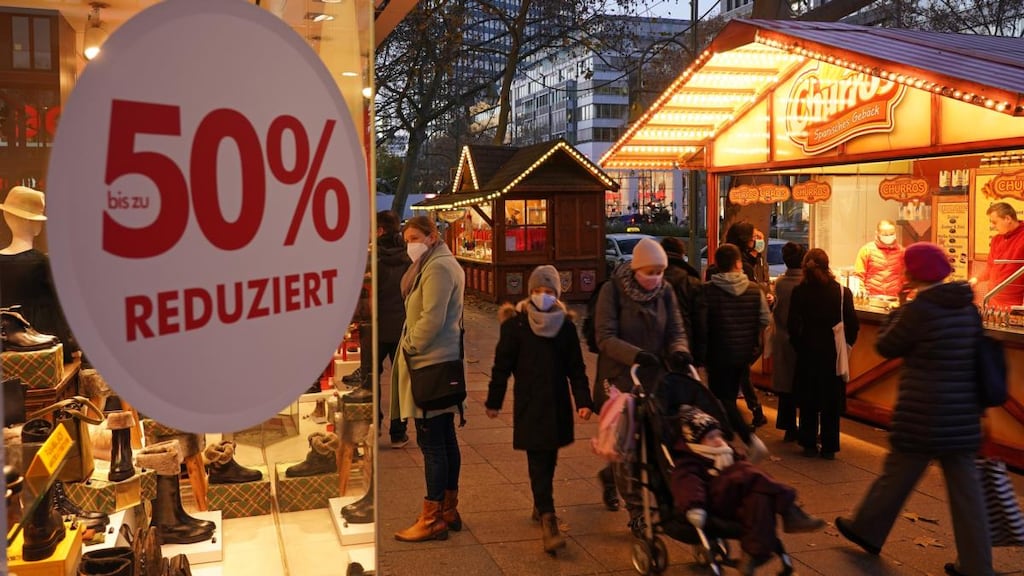 Christmas stalls and a shoe store advertising sales during the second wave of the coronavirus pandemic in Berlin. Photograph: Sean Gallup/Getty