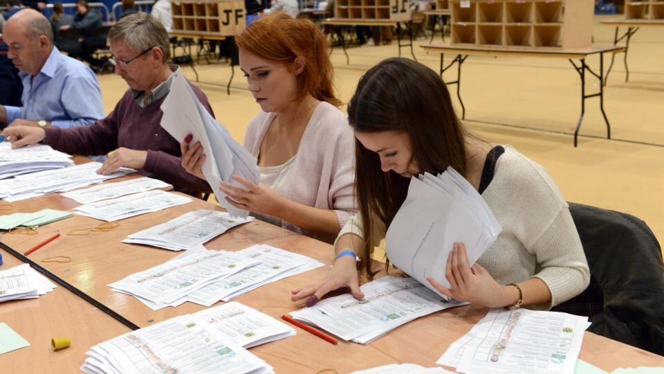Counting gets under way in the Dublin South West by-election as boxes are opened at the National Basketball Arena in Tallaght this morning. Photograph: Eric Luke / The Irish Times.