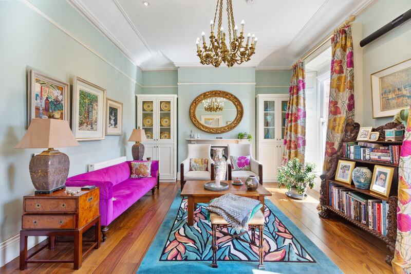 Colourfully-decorated livingroom. Photograph: Viv van der Holst