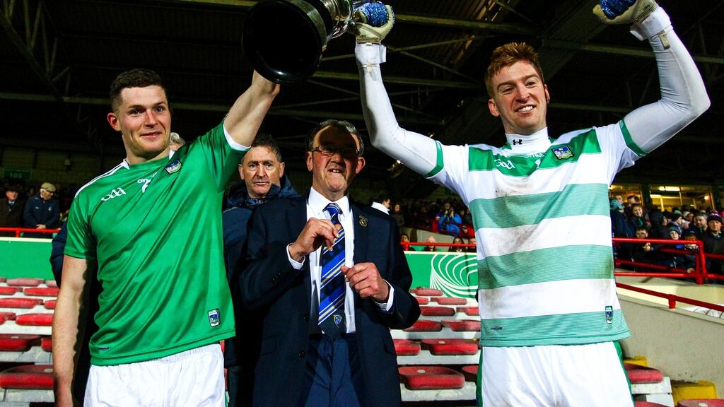 Limerick’s Iain Corbett and Donal O’Sullivan with the McGrath Cup after the victory over Cork at the LIT Gaelic Grounds in Limerick. Photograph: Ken Sutton/Inpho