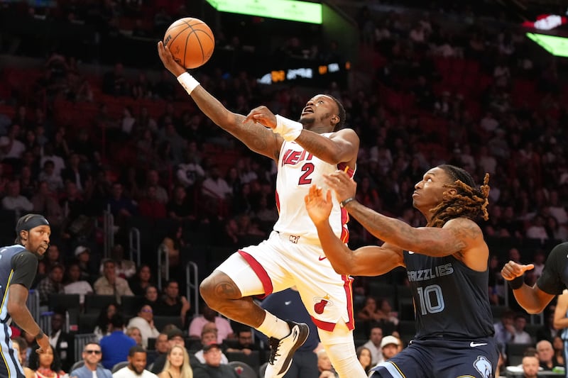 Miami Heat guard Terry Rozier drives to the basket as Memphis Grizzlies guard Javon Small defends during the second half of an NBA pre-season basketball game. Photograph: Marta Lavandier/AP