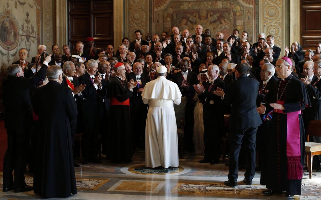 Pope Francis greets ambassadors and diplomats from the 180 countries that have diplomatic relations with the Holy See at the end of an audience at the Vatican yesterday. Photograph: Tony Gentile/AP Photo