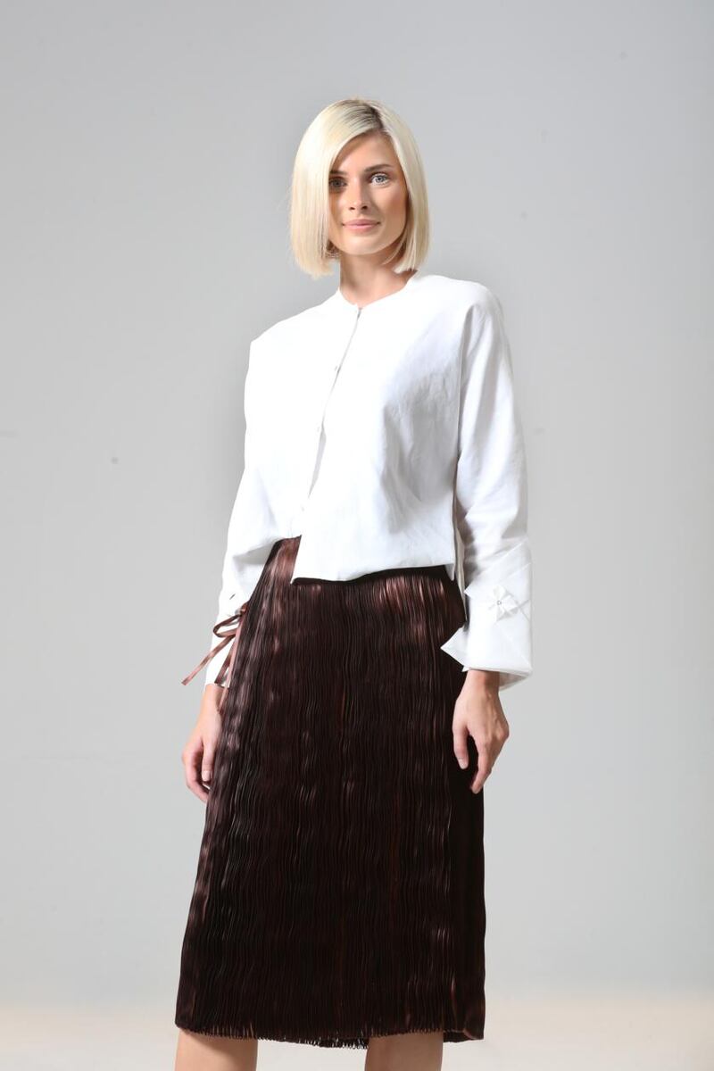 White organdie and poplin shirt with handstitched detail (€485) and ribbon skirt (€860), by Helen Hayes
