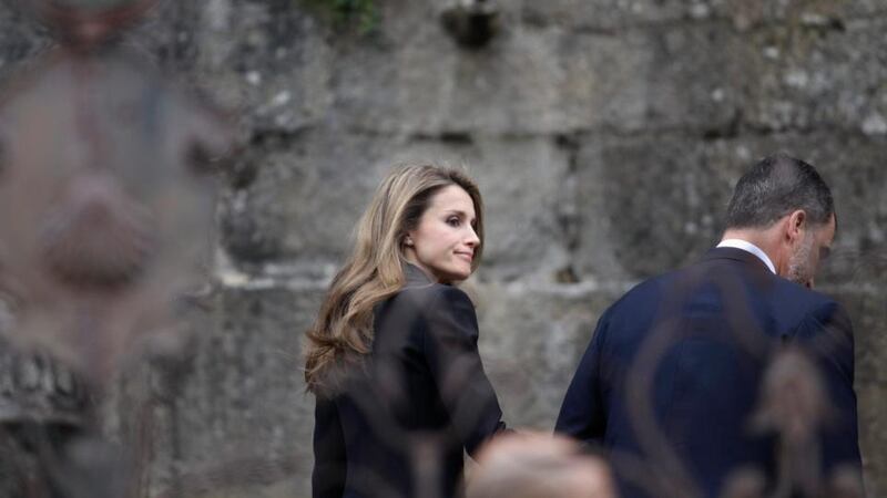 Spain’s Crown Prince Felipe (R) and Princess Letizia arrive to attend a funeral service in memory of the victims of the July 24th train crash  at the Cathedral of Santiago de Compostela. Photograph: Miguel Vidal/Reuters.