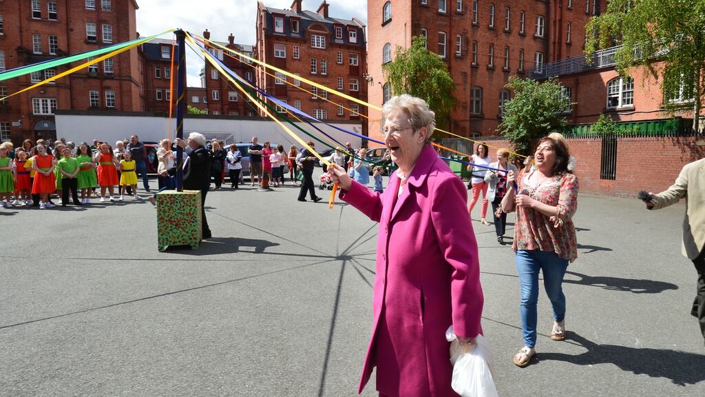 A Maypole in the Iveagh Flats, New Bride Street, Dublin. The Maypole never caught on in Ireland. A few were erected but in 1798 they were used as gibbets to hang rebels from, which made them less attractive for a dance. Photograph: Alan Betson