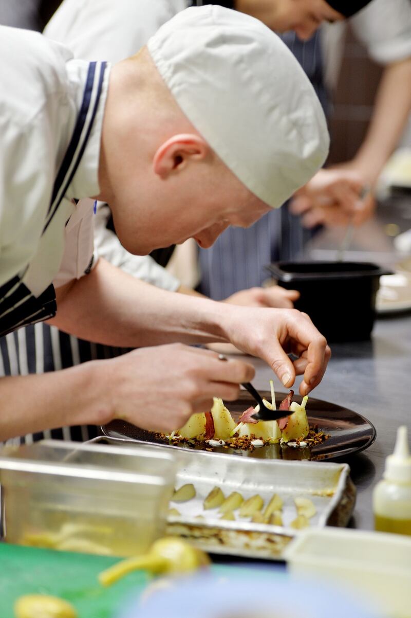 Paddy Walsh Chef de Partie preparing food for clients. Photograph: Alan Betson / The Irish Times