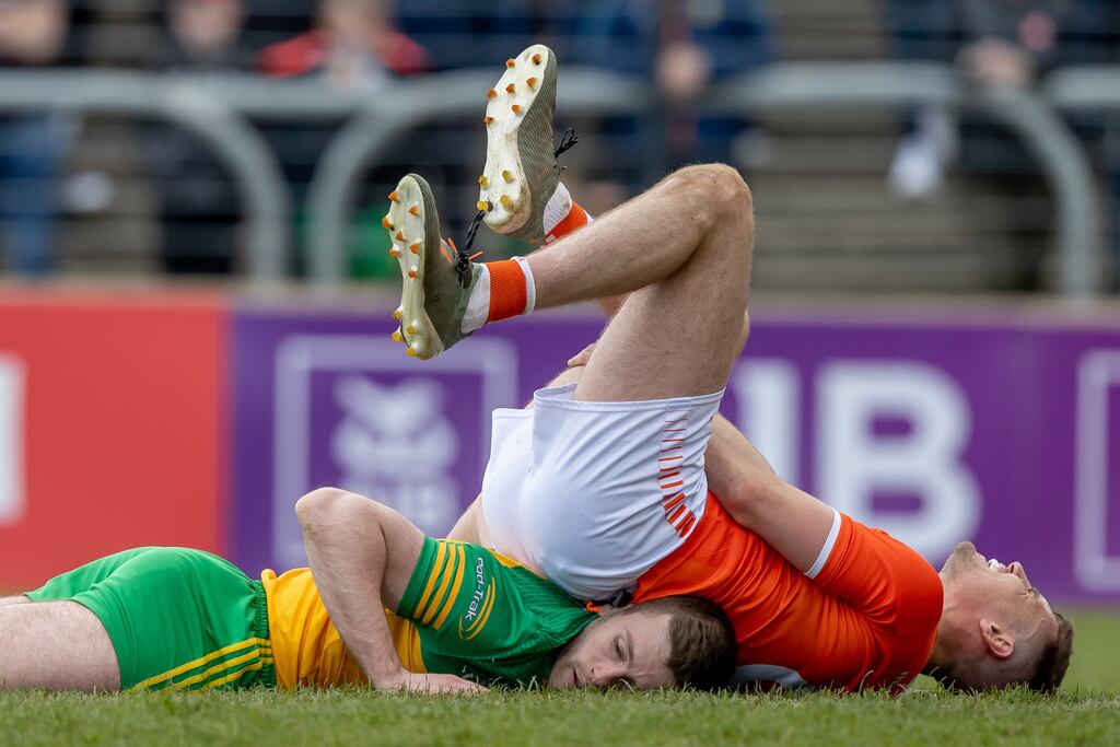 Donegal's Eoghan Ban Gallagher and Armagh's Greg McCabe after a collision during the sides' last outing at MacCumhaill Park, Ballybofey in April. Photograph: Morgan Treacy/Inpho
