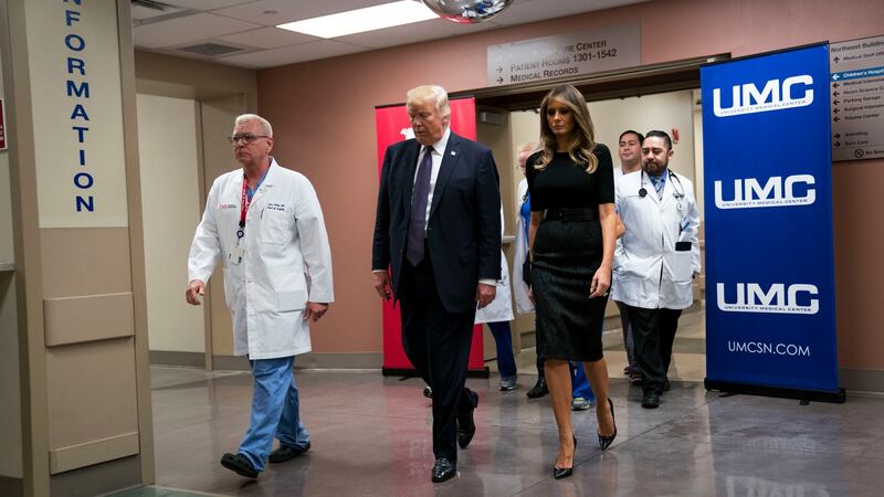 US president Donald Trump and first lady Melania Trump walk with doctors after visiting shooting victims at the University Medical Centre in Las Vegas, Nevada. Photograph: Doug Mills/The New York Times
