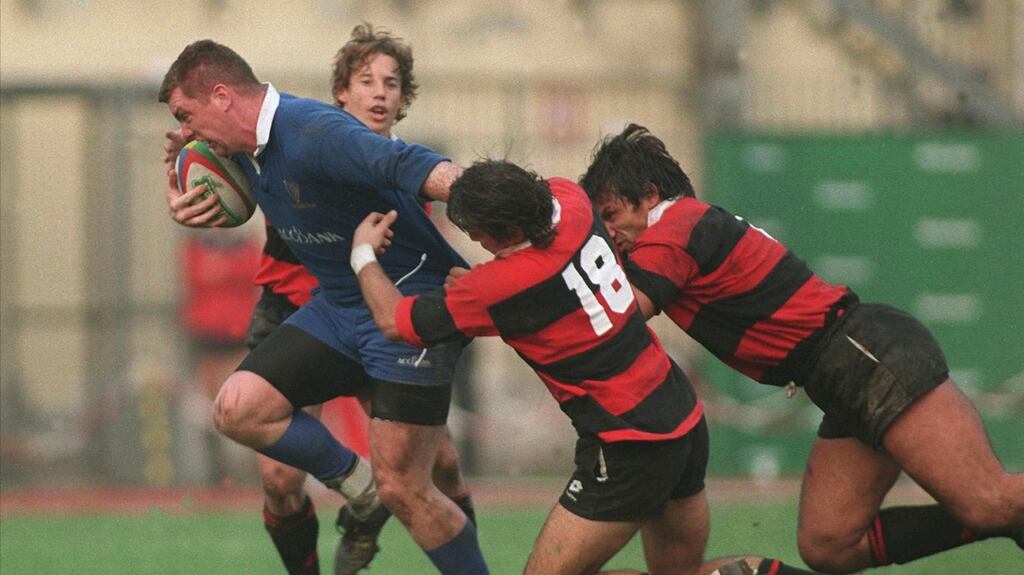 Victor Costello of Leinster breaks the Milan defence during their European Cup game in  1996. Photograph: Inpho