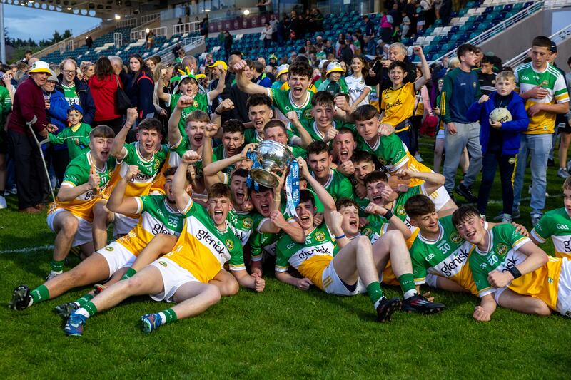 Offaly celebrate with the Fr Larry Murray Trophy. Photograph: Morgan Treacy/Inpho