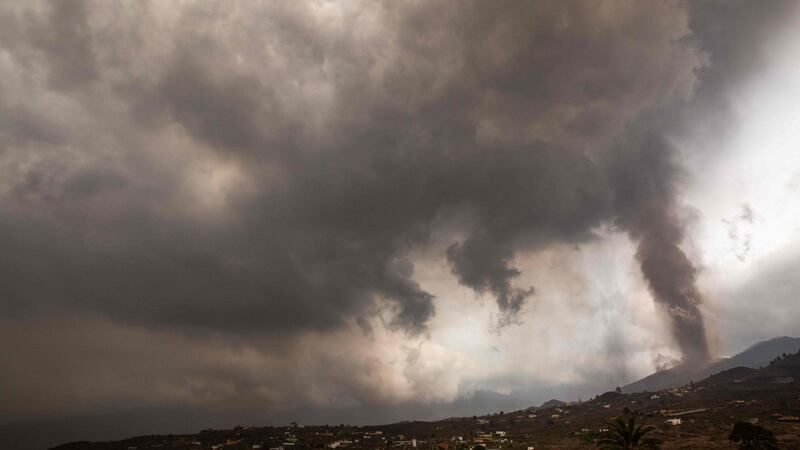 A thick cloud of ash and gas rises from the volcano. Photograph: Getty