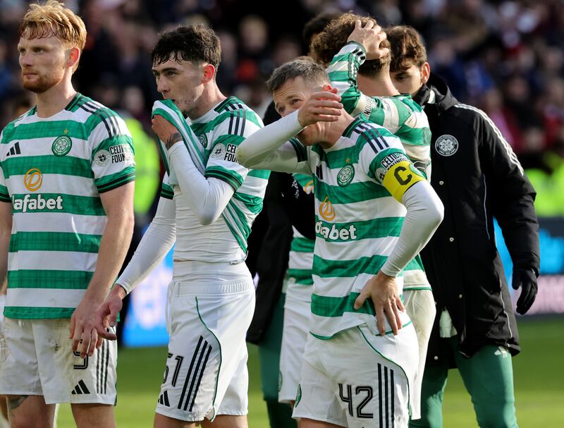 Celtic's players react at full-time. Photograph: Steve Welsh/PA
