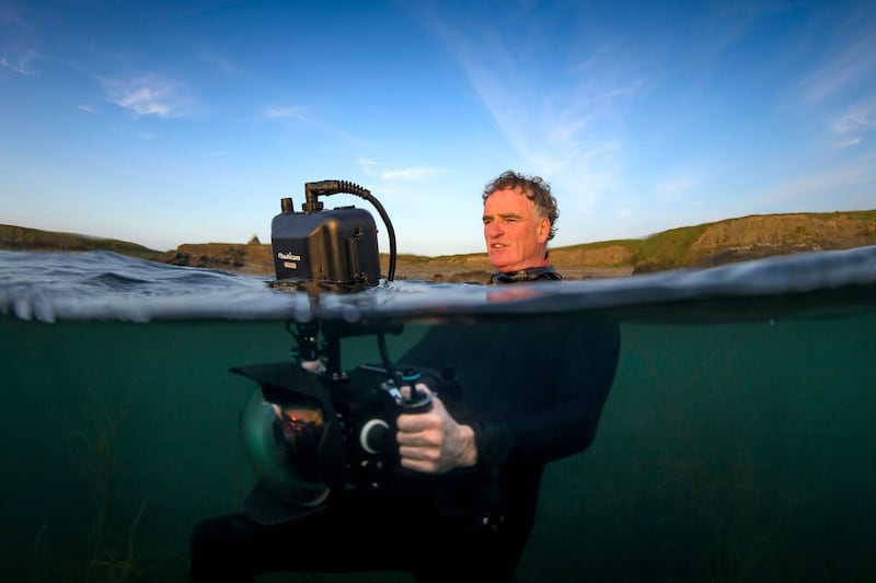 Underwater cameraman Ken O’Sullivan filming on location off the west coast: Photograph: George Karbus