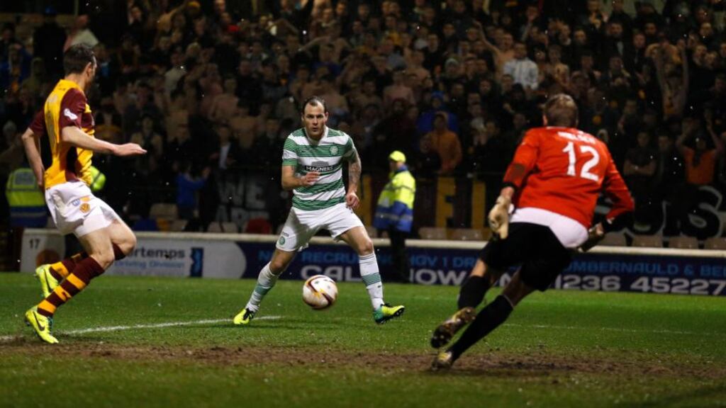 Celtic’s Anthony Stokes scores against Motherwell during their Scottish Premier League match on Friday night. Photograph: Russell Cheyne/Reuters