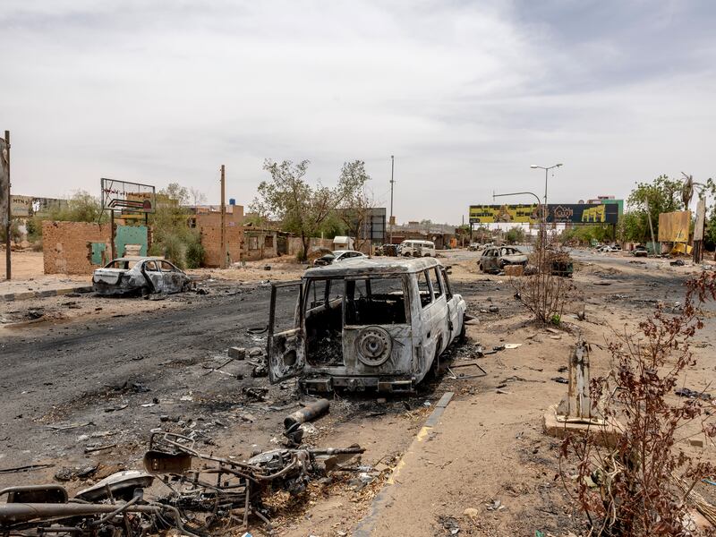 Destroyed vehicles litter the road in a liberated area of Omdurman, outside Khartoum, on April 24th. Photograph: Ivor Prickett/The New York Times