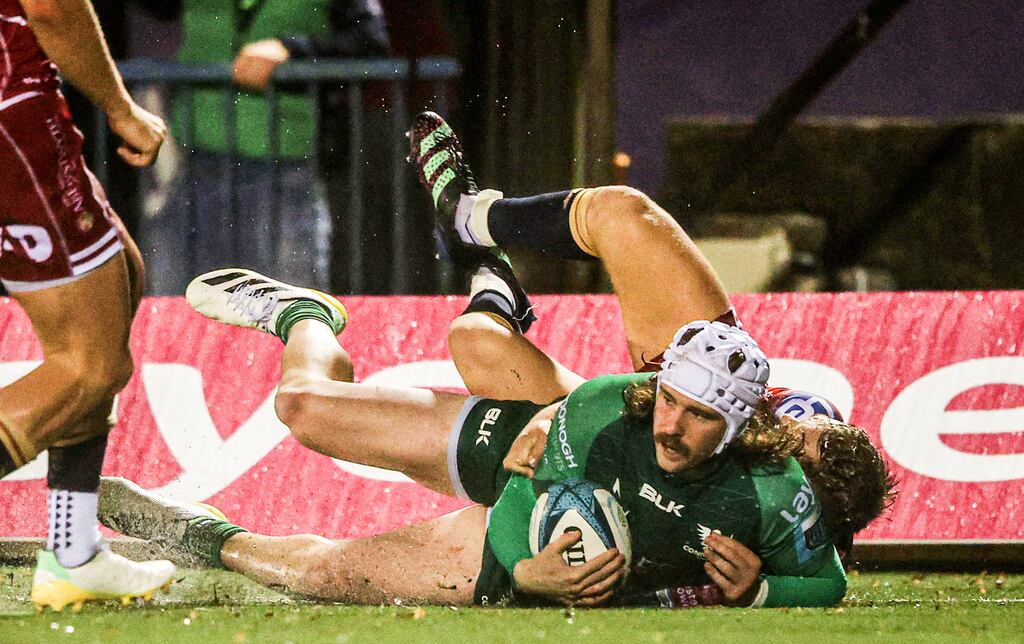 Connacht's Mack Hansen scores his side’s second try during the United Rugby Championship game against Scarlets at the Sportsground in Galway. Photograph: Tom Maher/Inpho