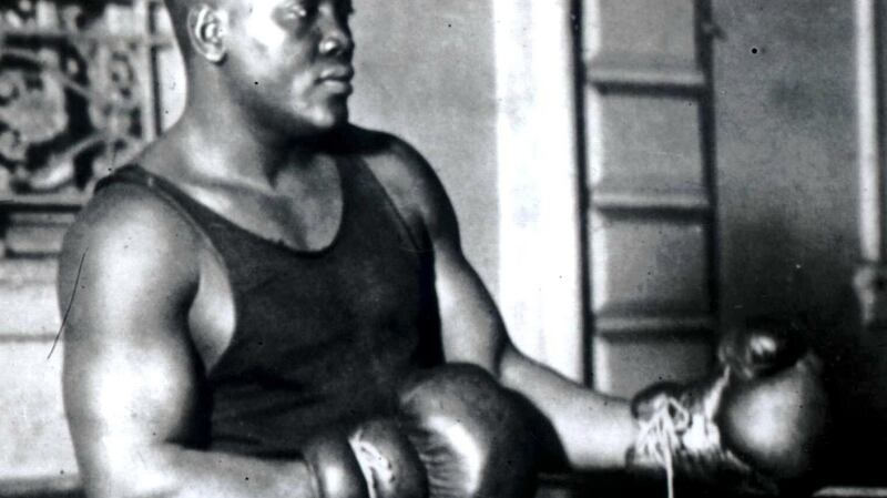 On boxing day 1907 Jack Johnson secured his place in sporting history when he became the first black heavyweight champion of the world. Fighting Tommy Burns in Sydney Australia, the fight was eventually halted when the police intervened in the fourteenth round. Photograph: Hulton Getty/Allsport