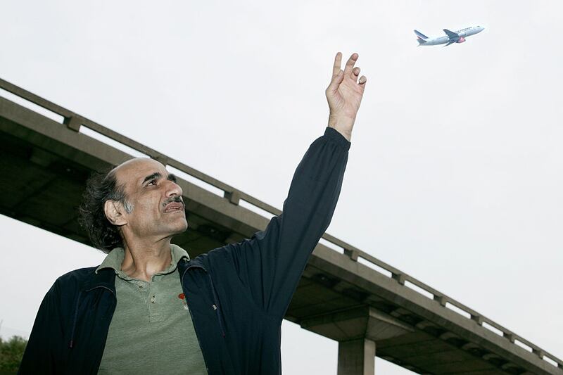 Mehran Karimi Nasseri on a rare foray outdoors. Photograph: Eric Fougere/Corbis/Getty Images