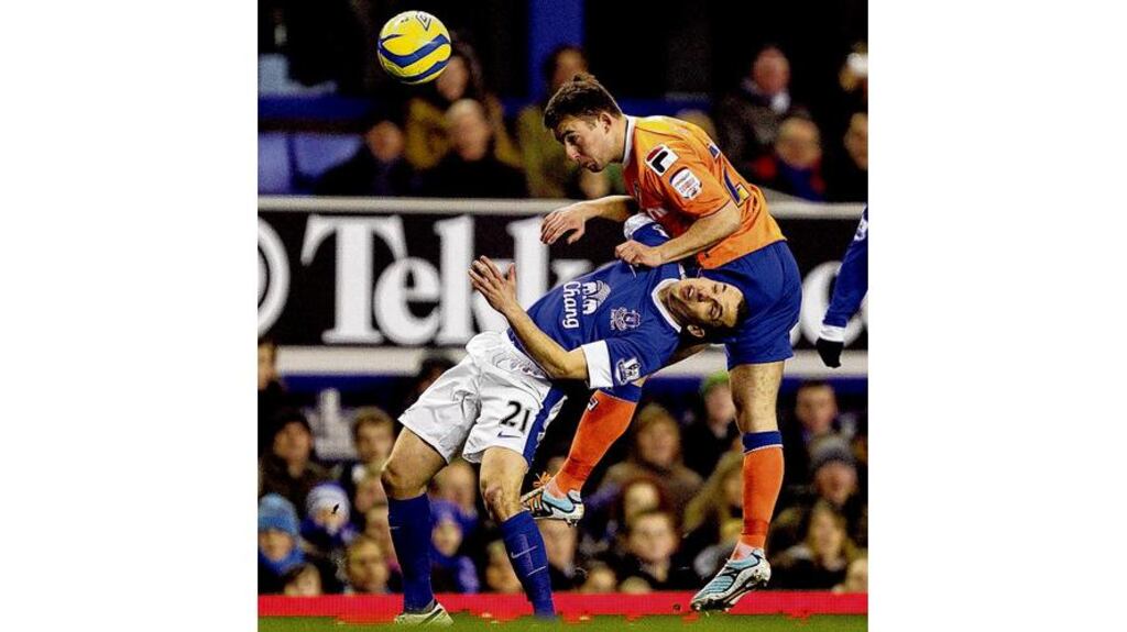 Oldham's cup hero Matt Smith comes off the bench to give his a lifeline against Everton. photograph: peter byrne/pa