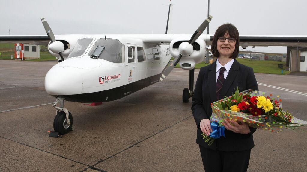 Loganair’s millionth passenger, Anne Randall, frequently uses the service for work.  Photograph: Ken Amer/Loganair/PA