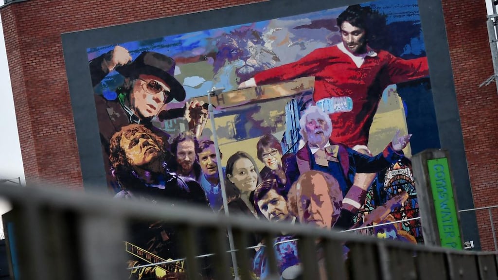 A mural by artist Dee Craig highlighting cultural figures from east Belfast including Van Morrison, George Best, CS Lewis, James Ellis and Gary Moore. Photograph: Charles McQuillan/Getty