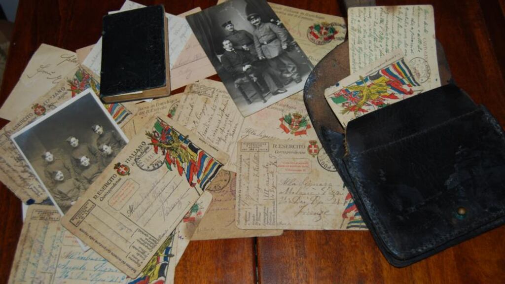 First World War memorabilia including a photograph of what appear to be of members of the Royal Flying; a photograph of three German Soldiers; the cards sent by Emilio Pazzi; a leather pouch bought at a market in the Somme; a letter from an Austrian soldier calling himself only ‘A’; and a French prayerbook. Photograph: Oisín Patrick Murphy